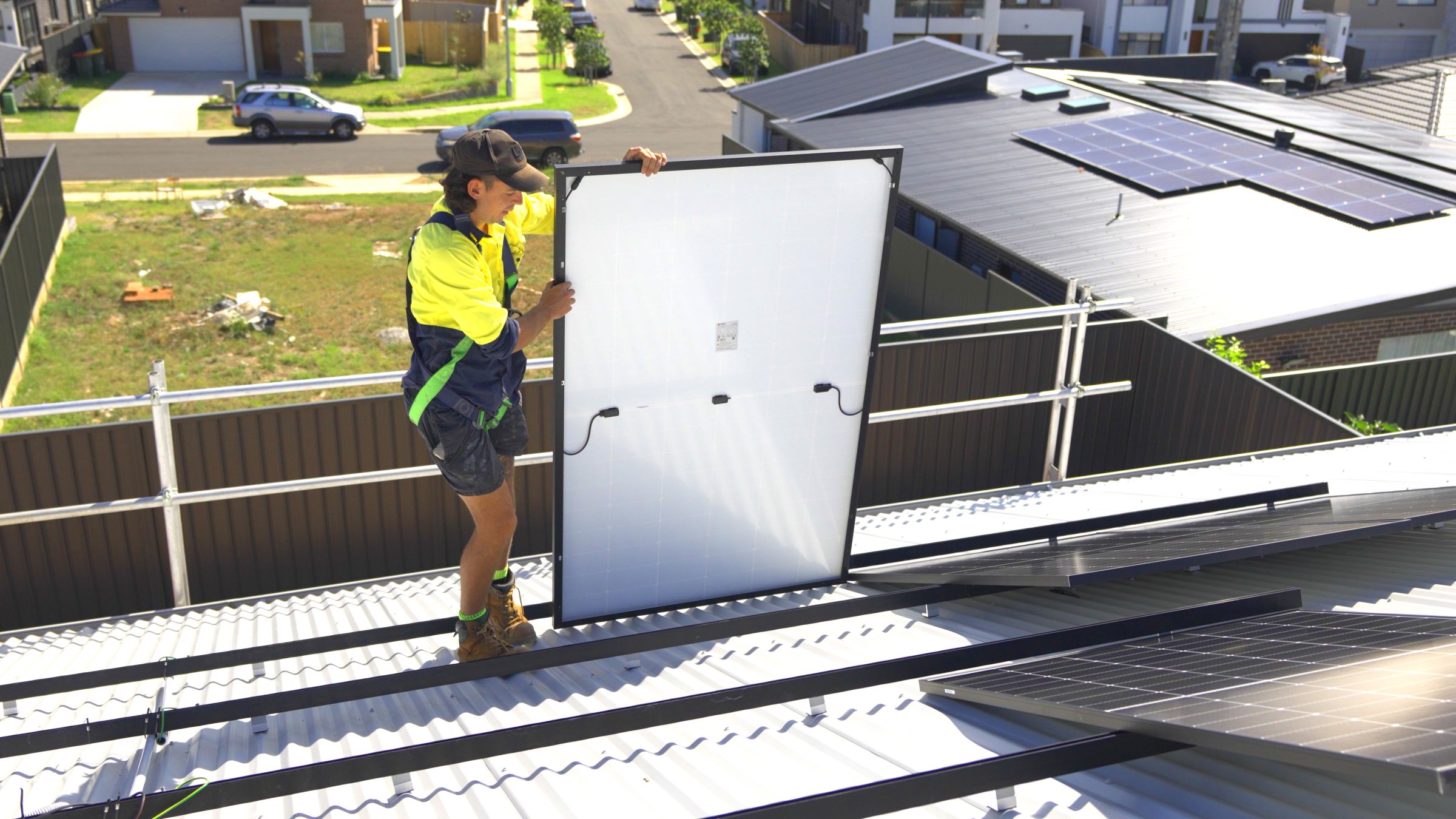 solar panels being installed on roof